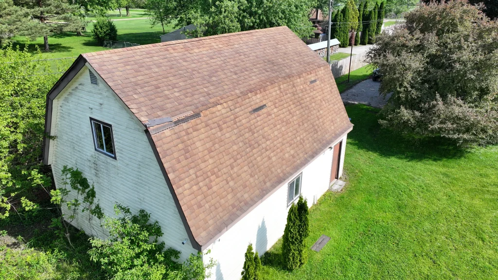 Aging asphalt shingle roof on a residential property