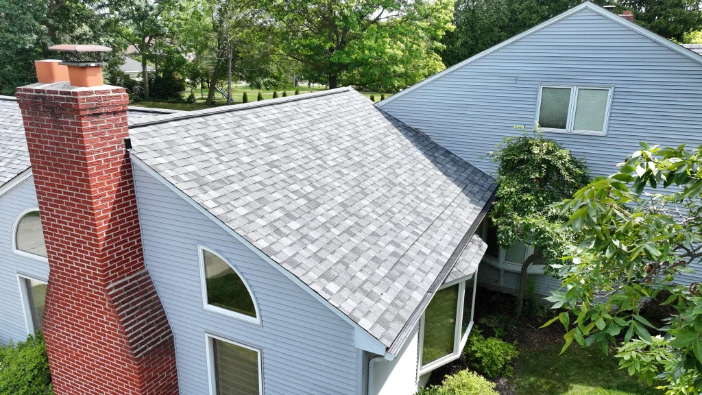 Gray architectural shingle roof installed on a residential home